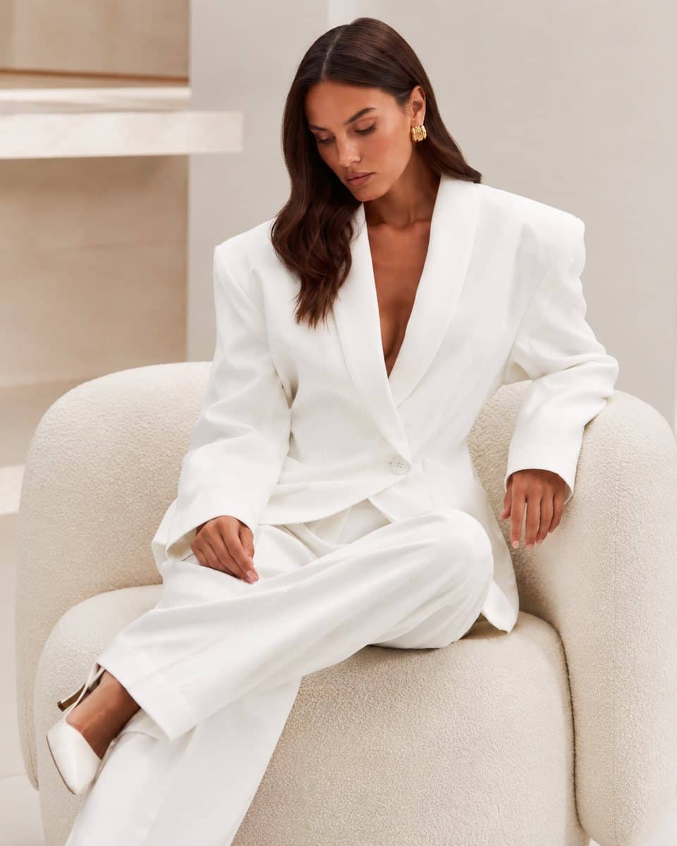 Sculpted White Suit — In context
